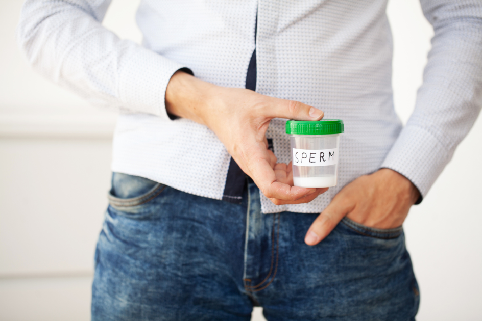 man holding jar